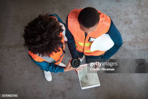 digitizing their dispatching duties - protective headwear stock pictures, royalty-free photos & images