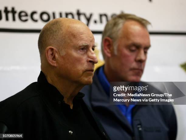 Governor Jerry Brown, left, and U.S. Secretary of the Interior Ryan Zinke listen during a Camp Fire press conference at the Cal Fire Incident Command...