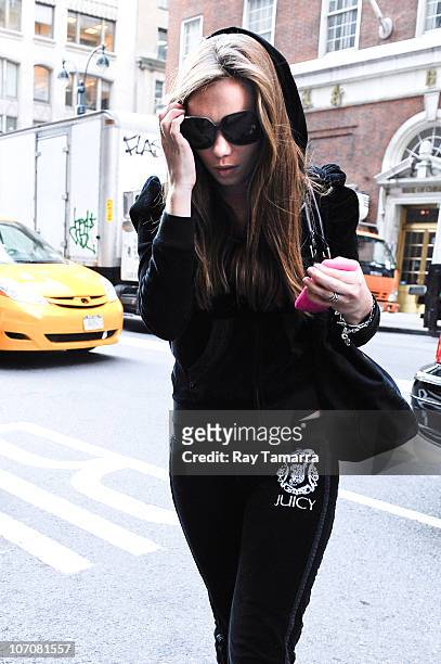 Adult film actress Capri Anderson enters a Midtown Manhattan office building on November 22, 2010 in New York City.