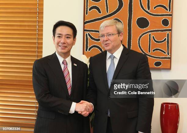 Japanese Foreign Minister Seiji Maehara and Australian Foreign Minister Kevin Rudd shake hands at Parliament House on November 23, 2010 in Canberra,...