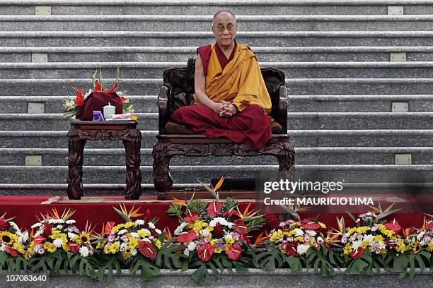 Tibetan spiritual leader Tenzin Gyatso, the 14th Dalai Lama, meditates during a teaching at Zu Lai Temple, in Cotia, 26km west of Sao Paulo, Brazil,...