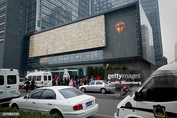 Petitioners over an illegal financing transaction gather outside the China Banking Regulatory Commission in Beijing, China, on Tuesday, Nov. 23,...