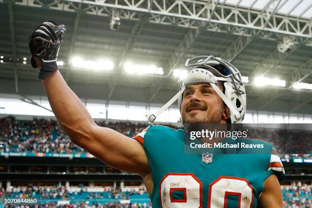 Danny Amendola of the Miami Dolphins celebrates their 34 to 33 win over the the New England Patriots at Hard Rock Stadium on December 9, 2018 in...