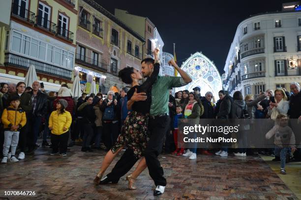 Natasha and Alfredo from Argentina perform Argentine tango on Malaga's Larios Street, during the Christmas Season 2018. On Sunday, December 9 in...