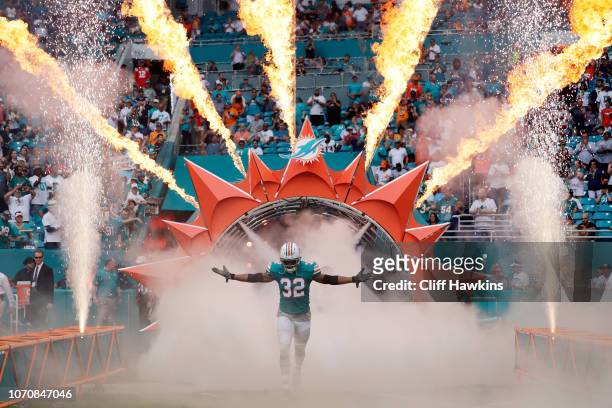 Kenyan Drake of the Miami Dolphins takes the field for their game against the New England Patriots at Hard Rock Stadium on December 9, 2018 in Miami,...