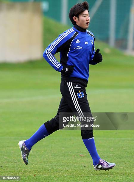 Heung Min Son runs during the Hamburger SV training session at Imtech Arena on November 23, 2010 in Hamburg, Germany.