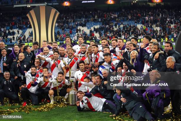The River Plate players and staff celebrate with the trophy at the end of the second leg of the final match of Copa CONMEBOL Libertadores 2018...