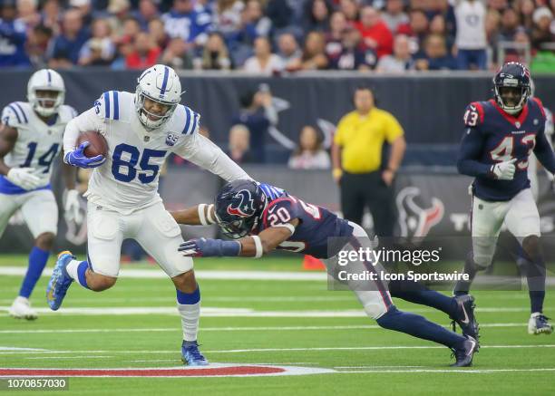 Houston Texans strong safety Justin Reid dives to tackle Indianapolis Colts tight end Eric Ebron during the football game between the Indianapolis...