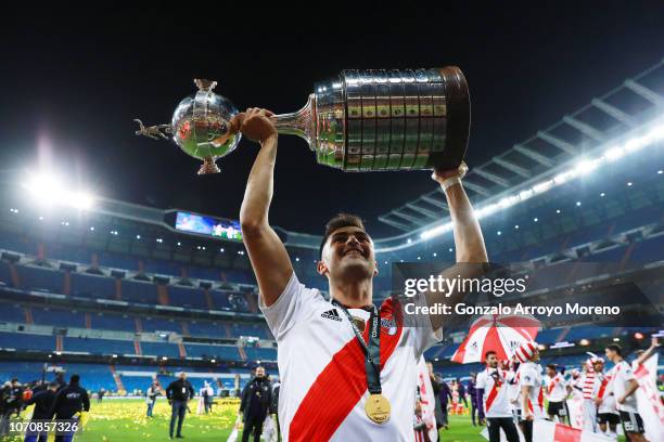 Gonzalo Martinez of River Plate celebrates with the Copa Libertadores Trophy following his sides victory in the second leg of the final match of Copa...