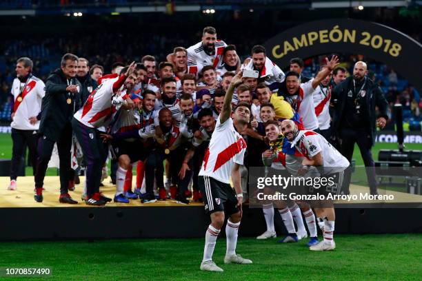 River Plate players take a selfie together as they celebrate following their sides victory in the second leg of the final match of Copa CONMEBOL...