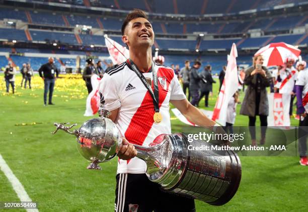 Gonzalo Martinez of River Plate celebrates with the trophy at the end of the second leg of the final match of Copa CONMEBOL Libertadores 2018 between...