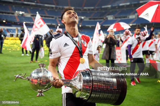 Gonzalo Martinez of River Plate celebrates with the trophy at the end of the second leg of the final match of Copa CONMEBOL Libertadores 2018 between...
