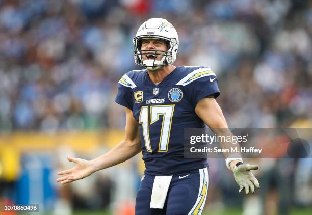 Quarterback Philip Rivers of the Los Angeles Chargers tries to get the attention of the referee after an incomplete pass in the fourth quarter...