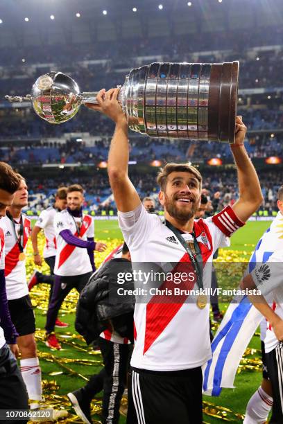 Leonardo Ponzio of River Plate celebrates with the Copa Libertadores trophy after the second leg of the final match of Copa CONMEBOL Libertadores...