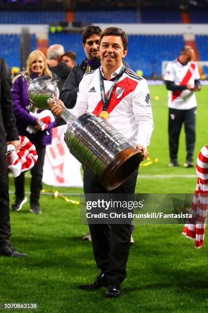 River Plate manager Marcelo Gallardo celebrates with the trophy following the second leg of the final match of Copa CONMEBOL Libertadores 2018...