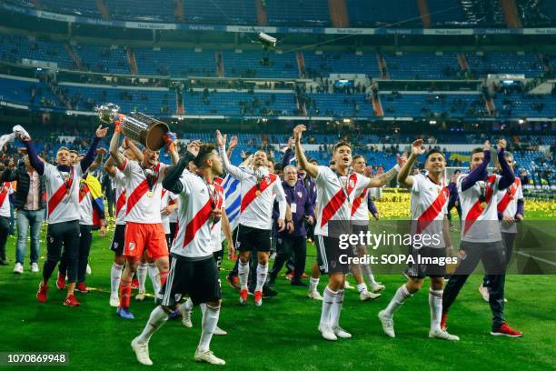 Players of River Plate celebrate after they won the Final of Copa CONMEBOL Libertadores 2018 at Estadio Santiago Bernabeu in Madrid. River Plate won...