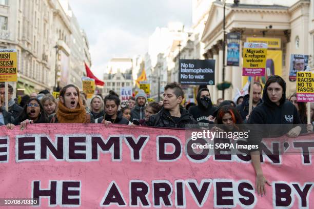 Counter protesters seen holding a large banner during a demonstration against the 'Brexit Betrayal March'. Thousands of people took to the streets in...