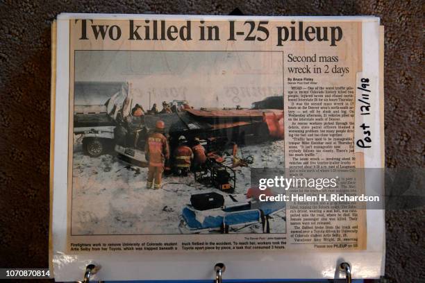 DARVADA, CO A scrap book holds newspaper articles from 1998 show the wreck that nearly took the life of Artis Jacobsen, at her home on December 9,...