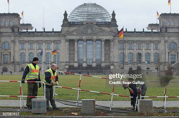 German police set up barricades in an out-of-the-ordinary measure near the Reichstag, seat of the Bundestag, or German parliament, along a road that...