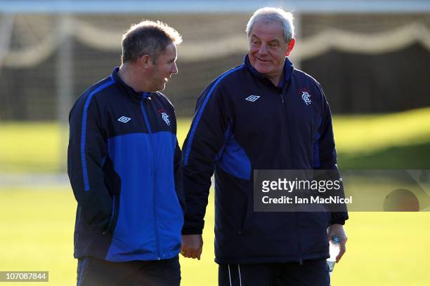 Walter Smith manager of Glasgow Rangers and assistant coach Ally McCoist chat during training at Murray Park prior to tomorrow night's UEFA Champions...