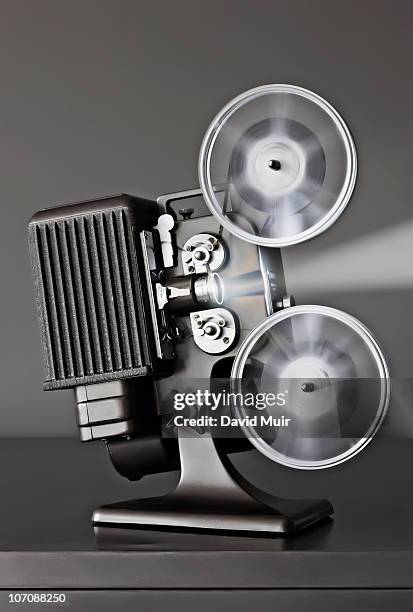 running movie projector - film projector stock pictures, royalty-free photos & images