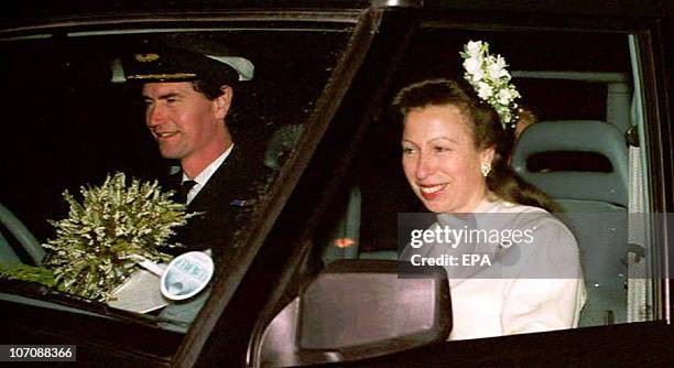 Commander Tim Laurence and Britain's Princess Anne are seen in their car after their wedding at Crathie Church 12 December 1992 in Scotland.