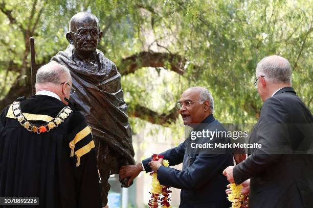 Ram Nath Kovind, President Of The Republic Of India prepares to place a wreath of flowers onto a Gandhi Statue at Jubilee Park, Parramatta on...