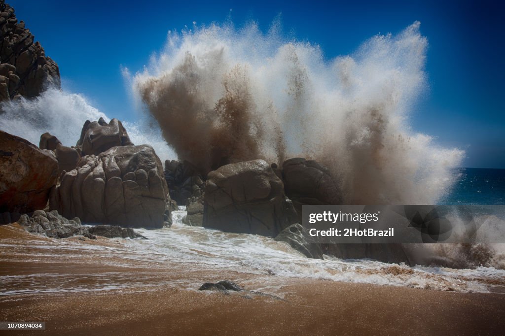 Exploding Wave On Rock High-Res Stock Photo - Getty Images