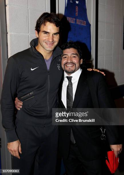 Roger Federer of Switzerland and Former Argentinian footballer Diego Maradona attend the ATP World Tour Finals at O2 Arena on November 23, 2010 in...