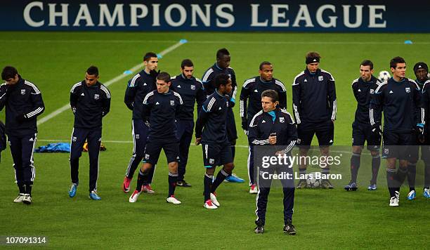 Head coach Claude Puel is seen with his players during a Olympique Lyon training session ahead of the UEFA Champions League match against FC Schalke...