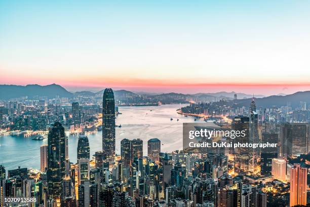 hong kong sunrise - hong kong skyline stockfoto's en -beelden