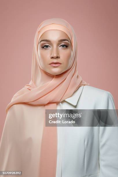 beautiful muslim woman wearing hijab - women with hijab stock pictures, royalty-free photos & images