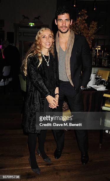 Franca Sozzani and David Gandy attend the Liberatum dinner hosted by Ella Krasner in honour of Sir V.S. Naipaul at The Landau in The Langham Hotel on...