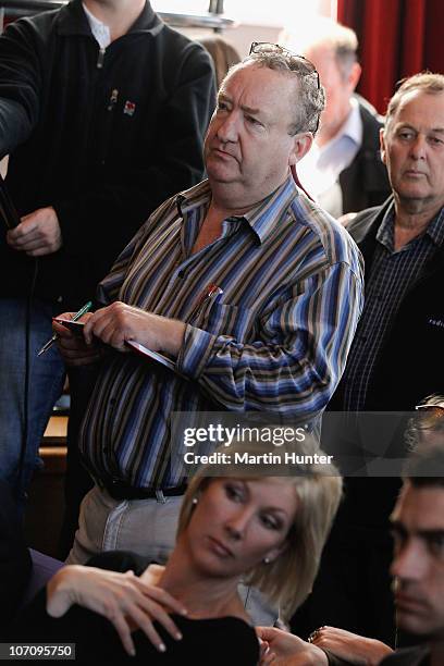 Journalist Ean Higgins of The Australian newspaper asks a question during a media briefing on November 24, 2010 in Greymouth, New Zealand. Police...