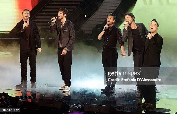Take That perform during the "X Factor" Italian TV Show Final held at RAI Studios on November 23, 2010 in Milan, Italy.