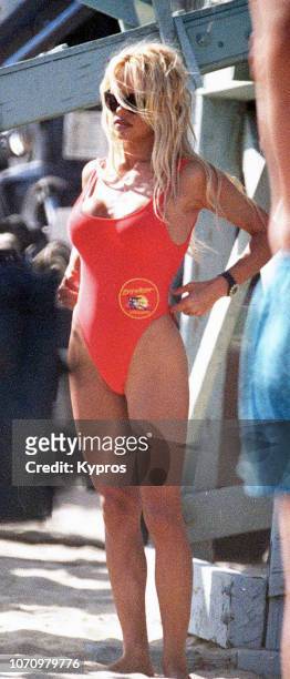Canadian actress Pamela Anderson on the set of action drama television series 'Baywatch', Los Angeles, California, US, circa 1996.