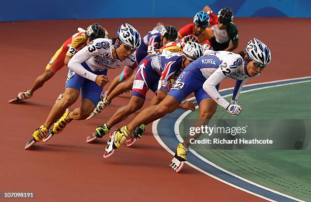 Geun Seong Son of South Korea on his way to winning the gold medal infront of Gwang Ho Choi of South Korea during the Roller Sports Men's 10000m...