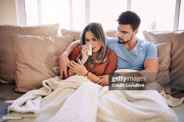 Sick Partner Sick Couple On Couch Photos and Premium High Res Pictures - Getty Images