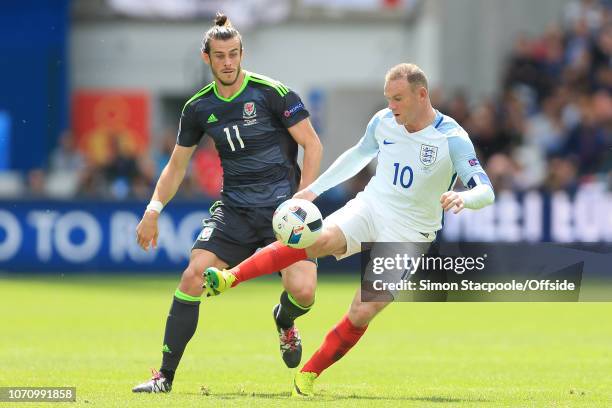 16th June 2016 - UEFA EURO 2016 - Group B - England v Wales - Wayne Rooney of England battles with Gareth Bale of Wales - .