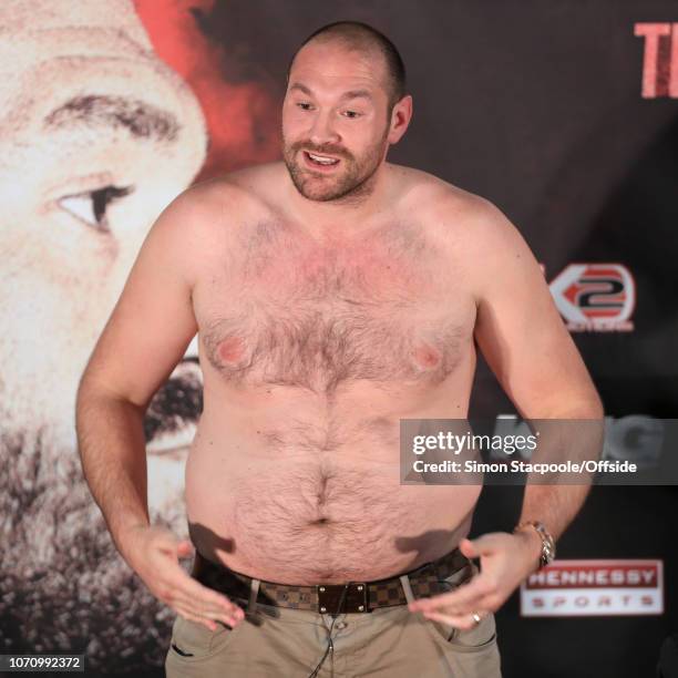 27th April 2016 - World Heavyweight Boxing - Press Conference - Tyson Fury & Wladimir Klitschko - Tyson Fury stands with a bare chest speaking about...