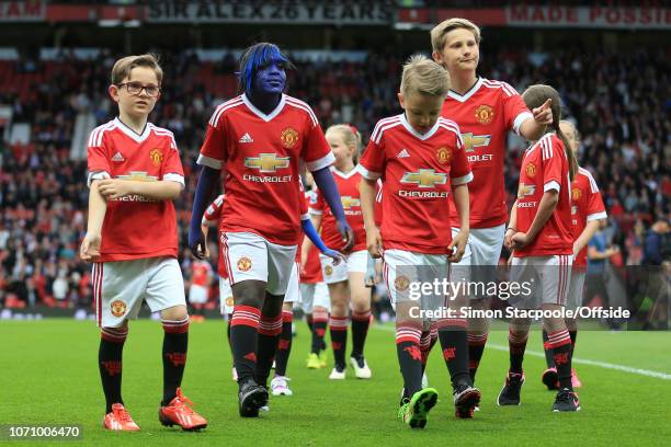 17th May 2016 - Barclays Premier League - Manchester United v Bournemouth - A young mascot girl with her face painted blue to promote the new 'X-Men'...