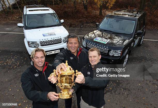 Land Rover ambassadors Percy Montgomery, Zinzan Brooke and Josh Lewsey hold the Webb Ellis trophy during a photocall to announce Land Rover as a...