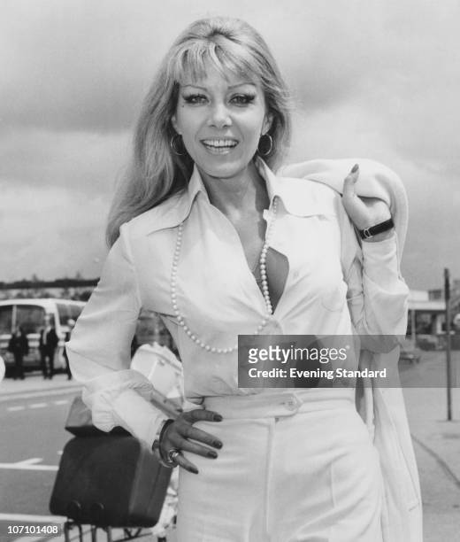 Polish-born actress Ingrid Pitt at London Airport, 17th July 1973. She is flying to the Taormina Film Festival in Sicily. She made a name for herself...
