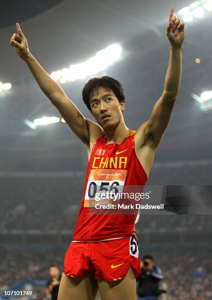 Liu Xiang of China wins the gold medal in the Men's 110m Hurdles at Aoti Main Stadium during day twelve of the 16th Asian Games Guangzhou 2010 on...