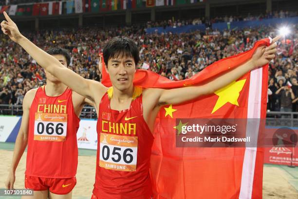 Liu Xiang of China wins the gold medal in the Men's 110m Hurdles at Aoti Main Stadium during day twelve of the 16th Asian Games Guangzhou 2010 on...