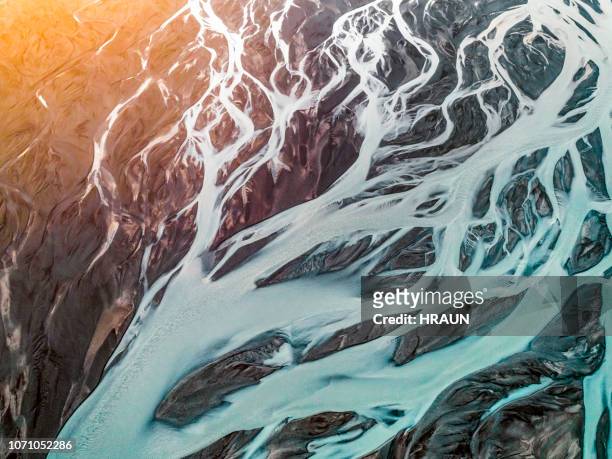 aerial view of braided river. - aerial view stock pictures, royalty-free photos & images