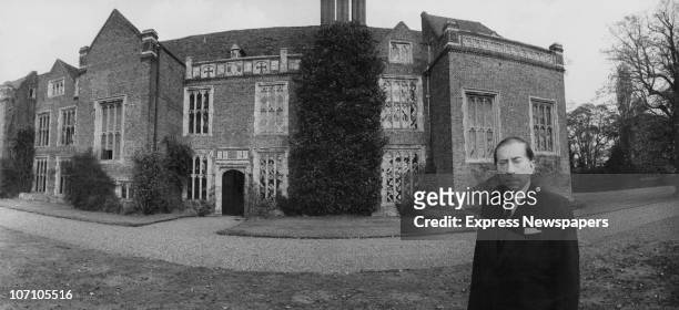 American industrialist J. Paul Getty outside Sutton Place, his Tudor manor house in Surrey, 16th October 1959. He has just purchased the house from...
