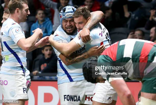 Olivier Klemenczak of Racing 92 celebrates scoring a try with Ole Avei during the Champions Cup match between Racing 92 and Leicester Tigers at Paris...