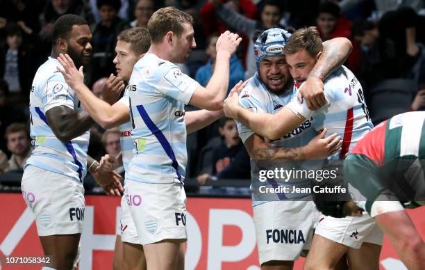 Olivier Klemenczak of Racing 92 celebrates scoring a try with Ole Avei during the Champions Cup match between Racing 92 and Leicester Tigers at Paris...