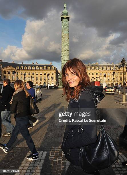 Super Model Helena Christensen walks on Place Vendome as she attends a Reebok EasyTone event on November 24, 2010 in Paris, France.